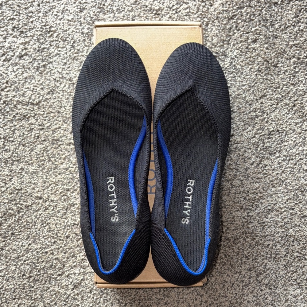 Rothy's Black Knit Slip-On Flats with Blue Accent